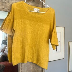 Flutter sleeve sweater.